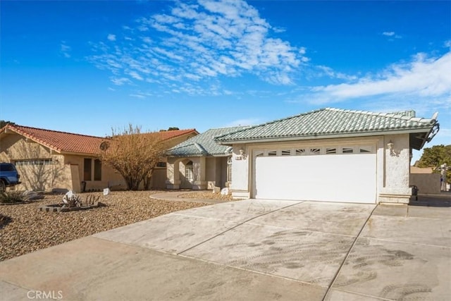 ranch-style home with a garage