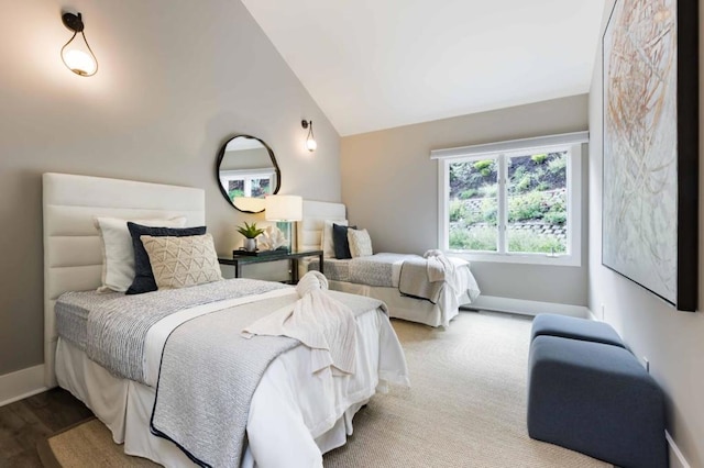 bedroom featuring vaulted ceiling