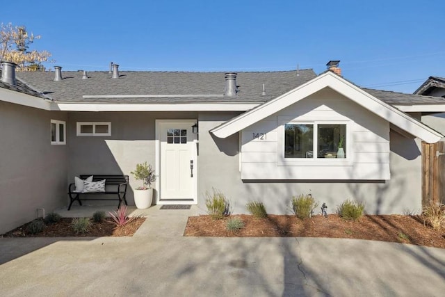 doorway to property featuring a patio area