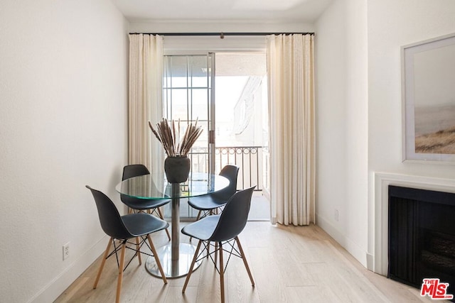 dining room featuring light wood-type flooring