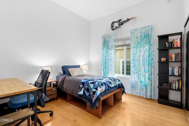 bedroom with light wood-type flooring