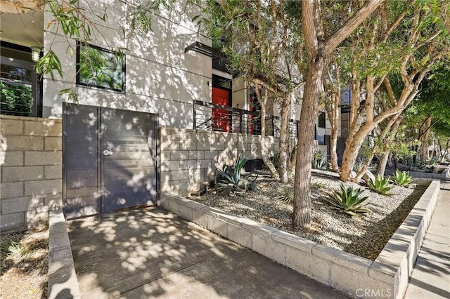 view of patio with a garage