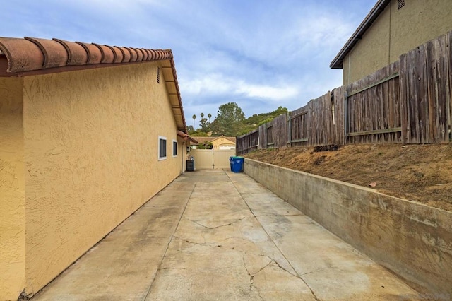 view of home's exterior with a patio area