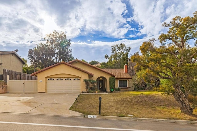 view of front of home with a garage