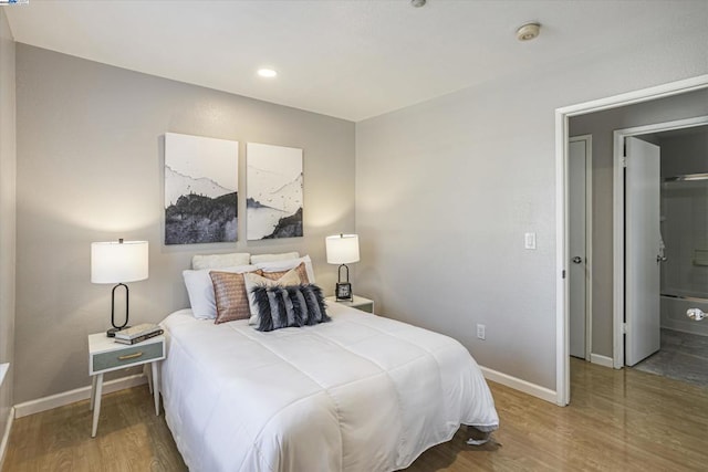 bedroom featuring hardwood / wood-style floors