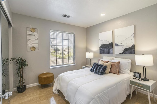 bedroom featuring hardwood / wood-style floors