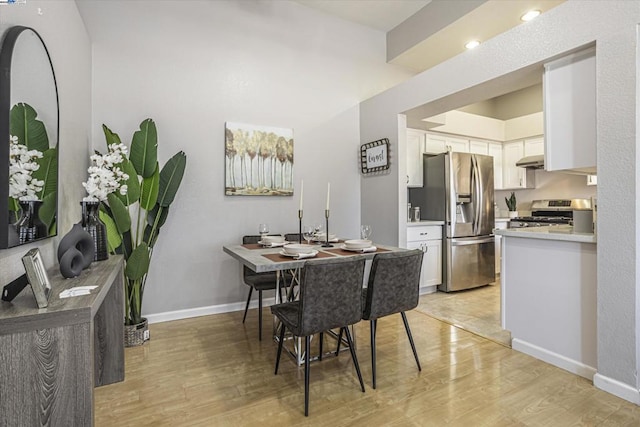 dining space featuring light hardwood / wood-style floors