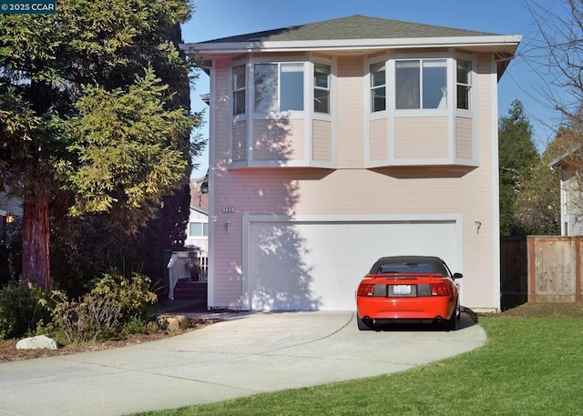 view of front of property featuring a garage