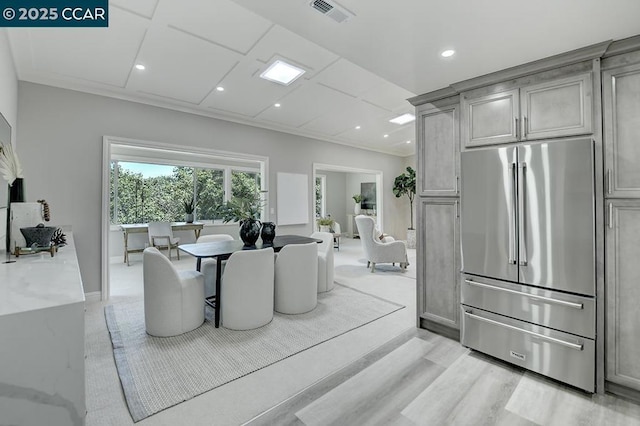 dining space featuring ornamental molding