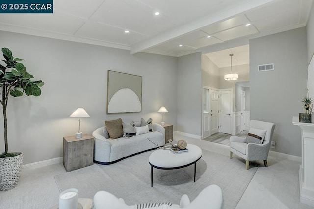 carpeted living room featuring beam ceiling