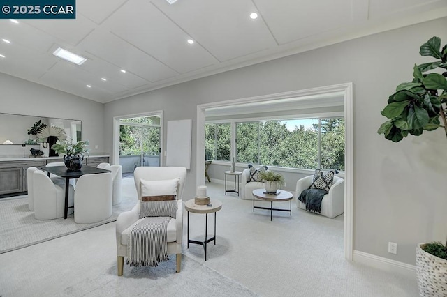 living room with light carpet and lofted ceiling