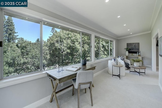 sunroom with a healthy amount of sunlight and vaulted ceiling