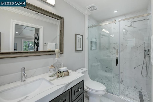 bathroom with an enclosed shower, vanity, toilet, and crown molding