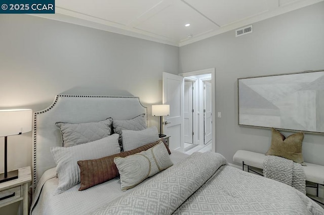 bedroom featuring crown molding