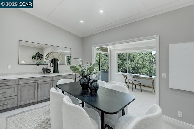 dining room with vaulted ceiling