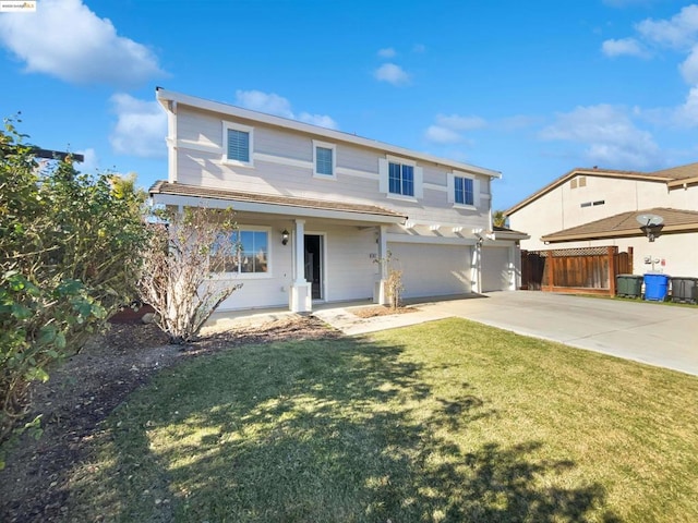 view of front facade featuring a front lawn and a garage