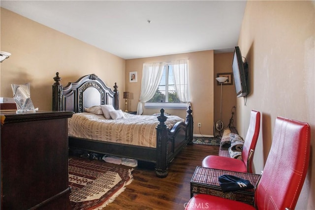 bedroom featuring dark wood-type flooring