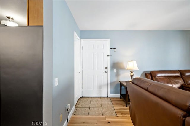 entryway with light hardwood / wood-style flooring