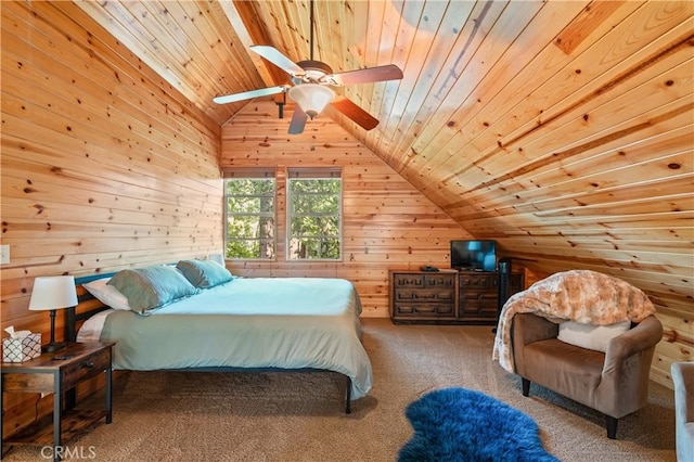 carpeted bedroom with ceiling fan, wooden walls, wood ceiling, and vaulted ceiling