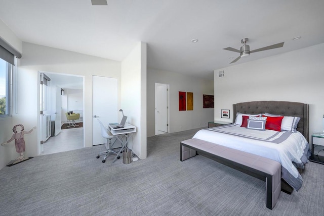 bedroom with ceiling fan and light colored carpet