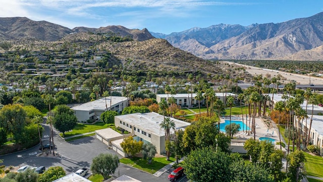 drone / aerial view featuring a mountain view