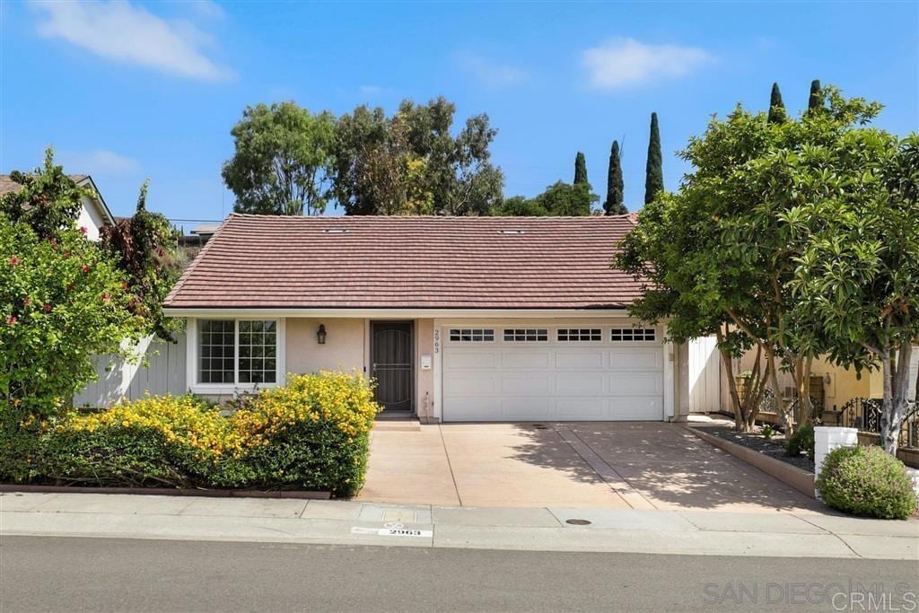 view of front of home with a garage