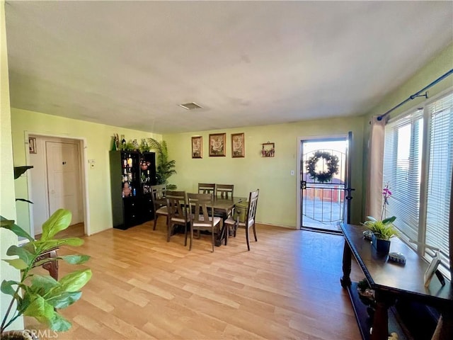 dining space featuring light hardwood / wood-style floors