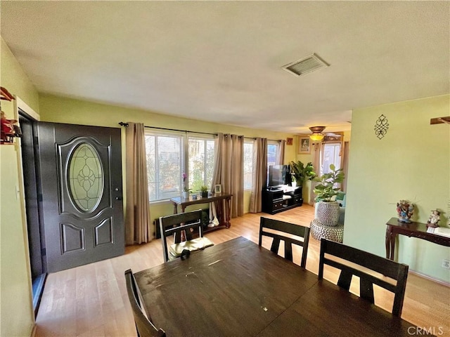 dining room featuring light wood-type flooring and ceiling fan