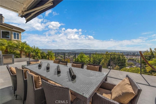 view of patio / terrace featuring a mountain view