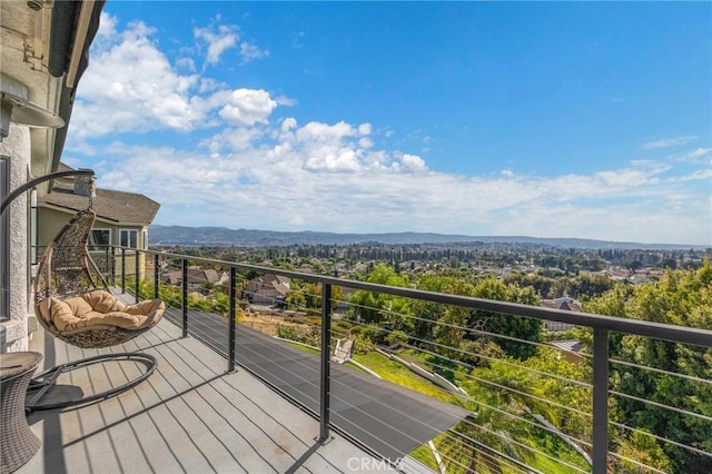 balcony featuring a mountain view