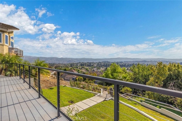 balcony featuring a mountain view