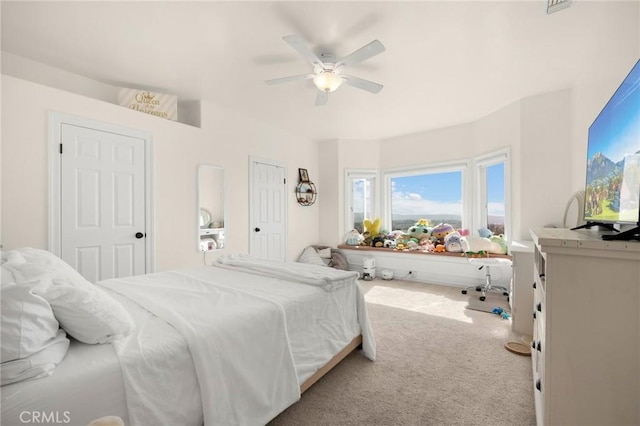 bedroom featuring ceiling fan and carpet floors