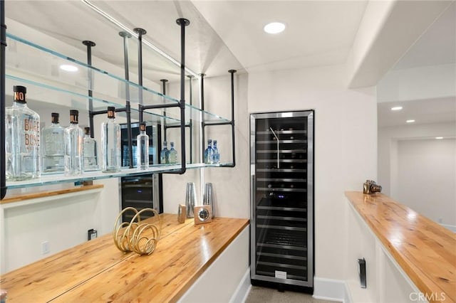 bar with butcher block countertops and wine cooler