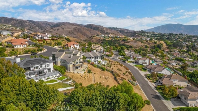 bird's eye view with a mountain view