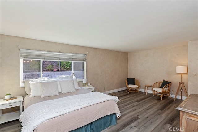 bedroom featuring dark wood-type flooring