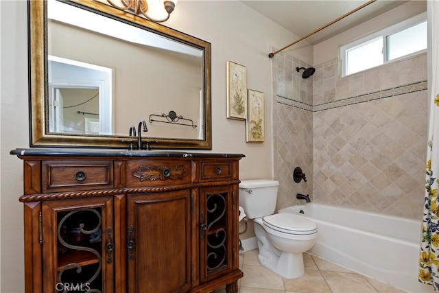 full bathroom with toilet, vanity, tile patterned flooring, and shower / bath combo with shower curtain