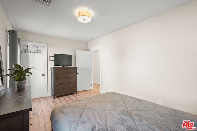 bedroom featuring light hardwood / wood-style flooring