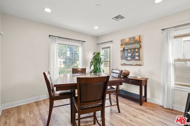 dining room featuring light wood-type flooring