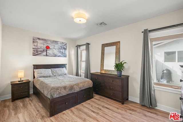 bedroom featuring light hardwood / wood-style flooring