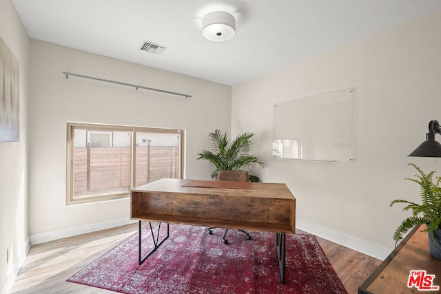 office featuring light hardwood / wood-style floors