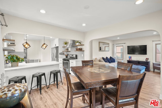 dining room featuring light wood-type flooring