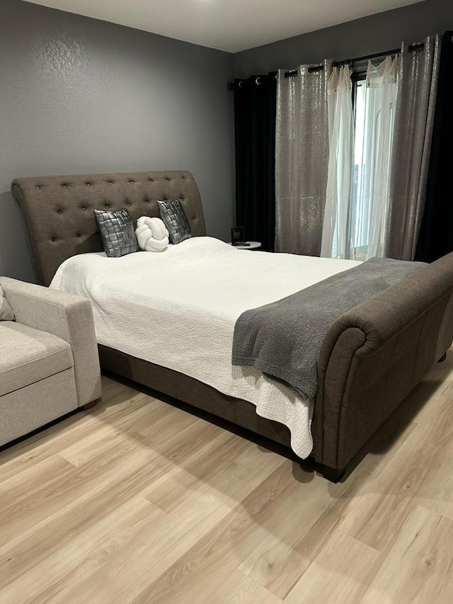 bedroom featuring light hardwood / wood-style flooring