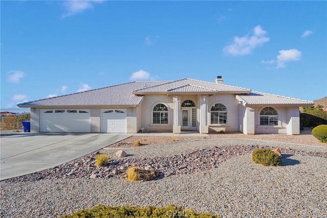 view of front of home with a garage