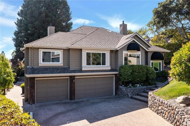 view of front of home with a garage