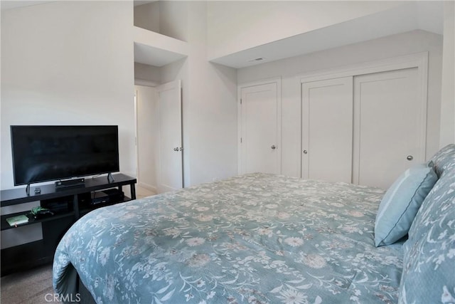 bedroom featuring lofted ceiling