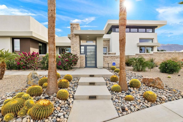 view of front of property with a mountain view