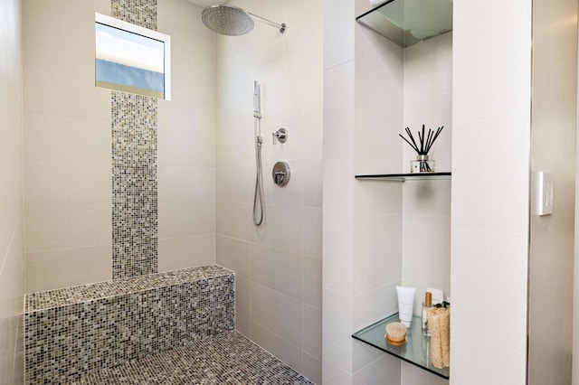 bathroom featuring tiled shower