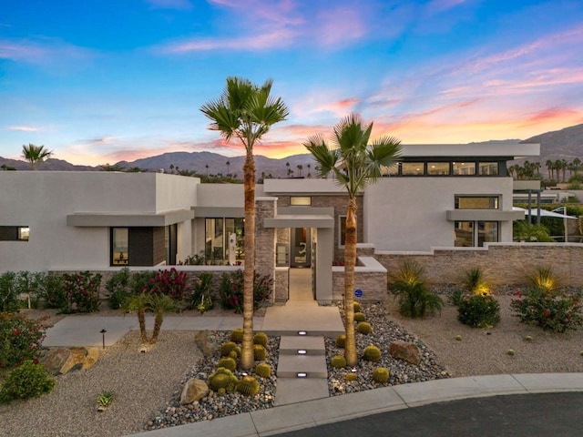 view of front of home with a mountain view