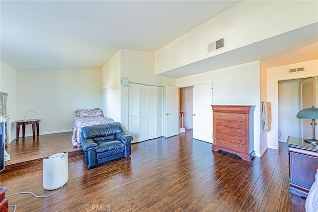 bedroom featuring dark wood-type flooring