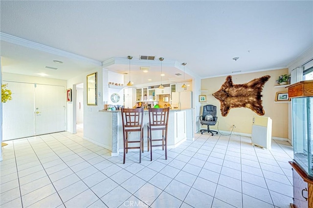 kitchen featuring light tile patterned flooring, white fridge with ice dispenser, ornamental molding, pendant lighting, and white cabinets